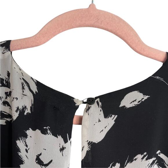 Love…Ady Black and White Floral Long Sleeve Romper - Picture 4 of 7